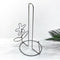 Stainless steel napkin holder.