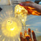 2-in-1 crystal table lamp with light reflection.