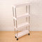 Kitchen storage rack with wheels.