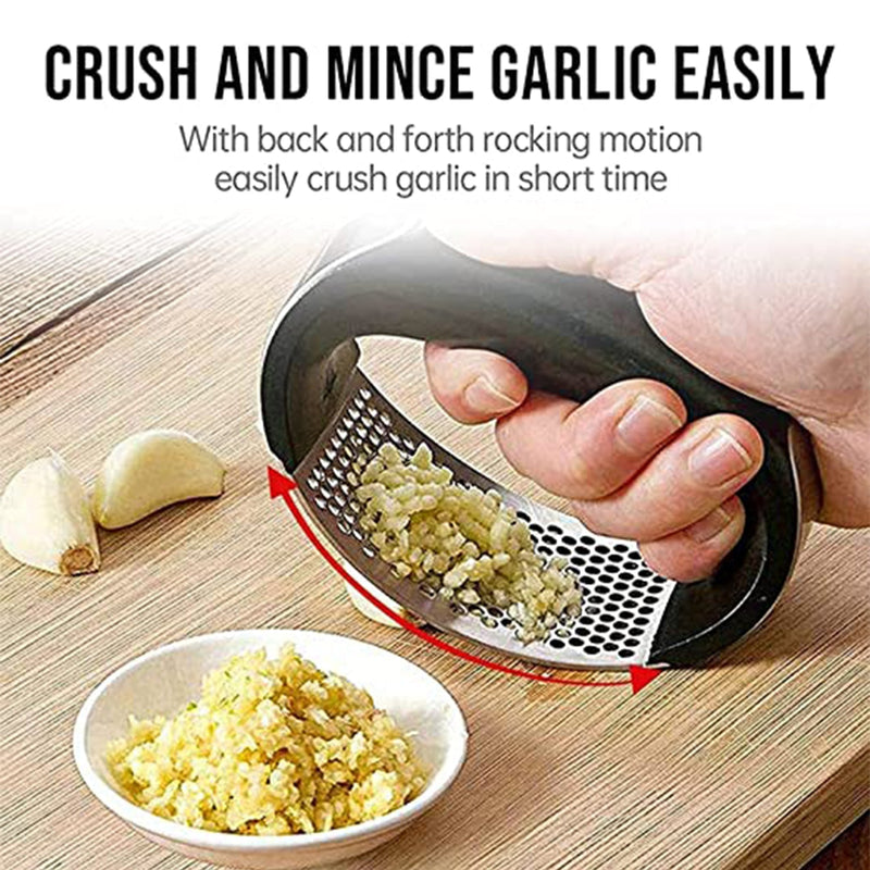 Garlic press in use