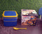 Blue portable lunch box with spoon and carrying handle